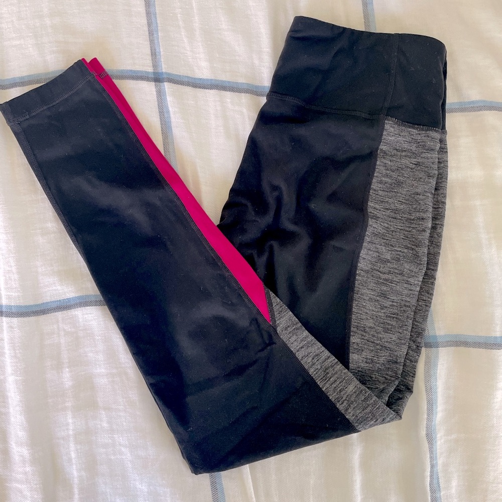 Athleta legging in black with pink and grey detail